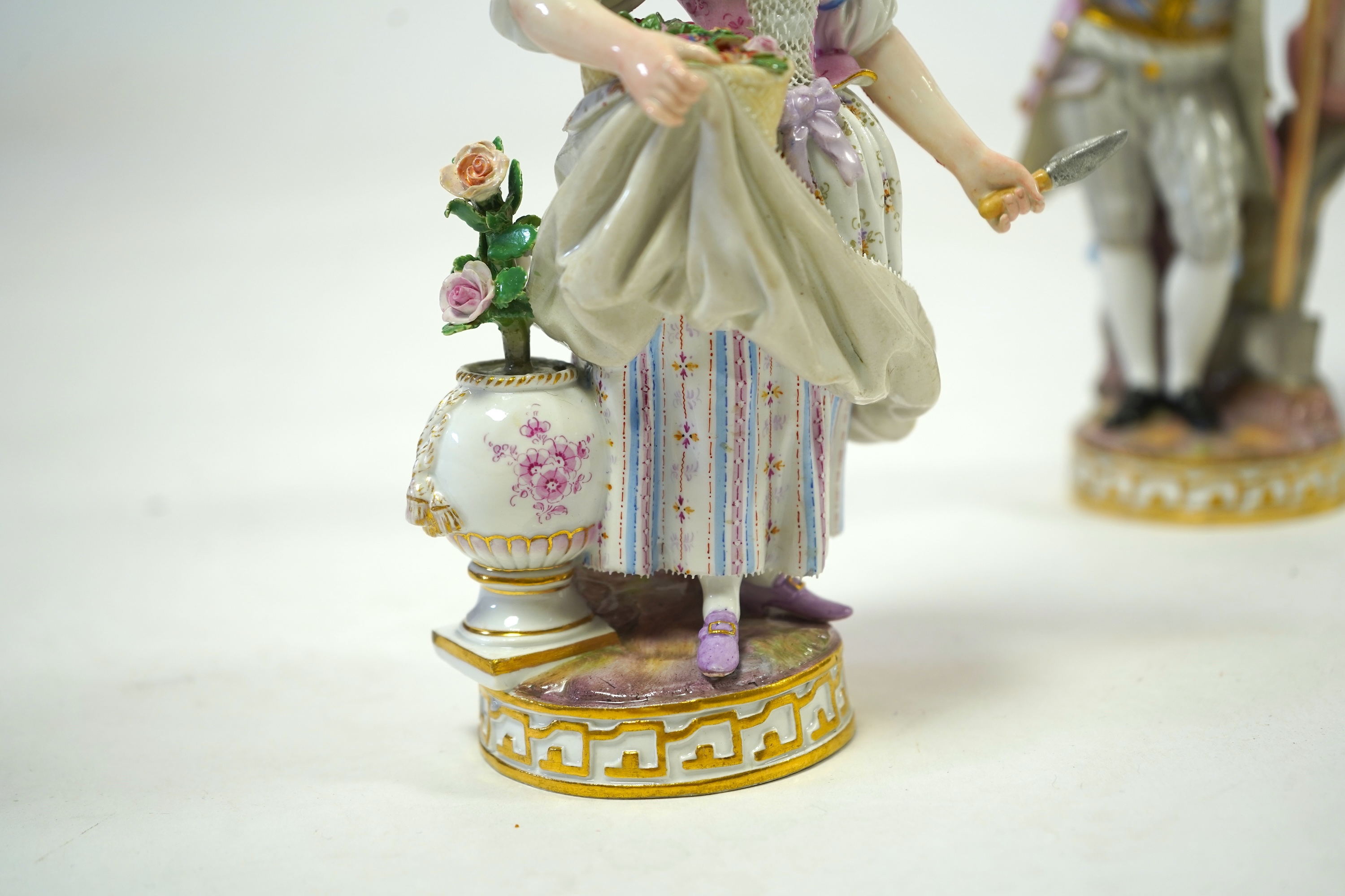 A pair of Meissen porcelain figures of gardeners, late 19th century